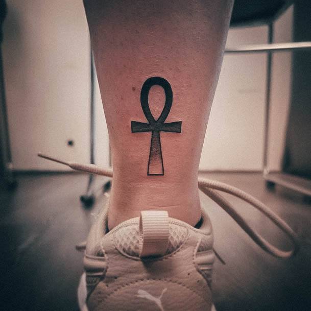 Girl With Graceful Ankh Tattoos
