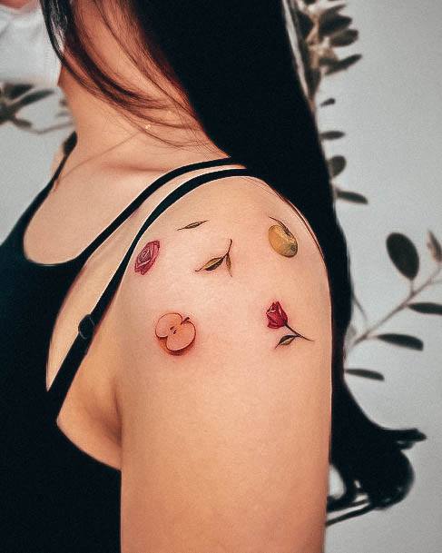 Girl With Graceful Apple Tattoos