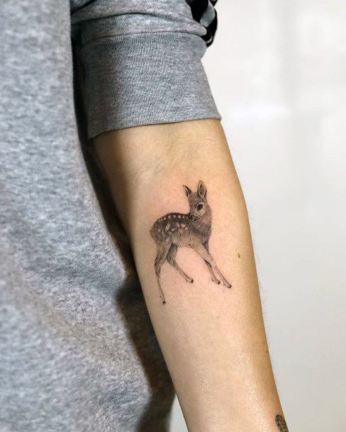 Girl With Graceful Bambi Tattoos