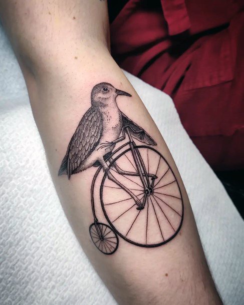 Girl With Graceful Bicycle Tattoos