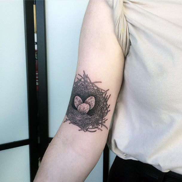 Girl With Graceful Birds Nest Tattoos