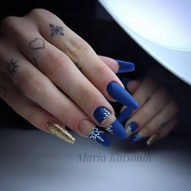 Girl With Graceful Blue And Gold Nails