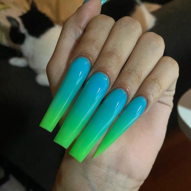 Girl With Graceful Blue And Green Nails