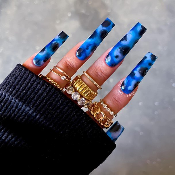 Girl With Graceful Blue Summer Nails