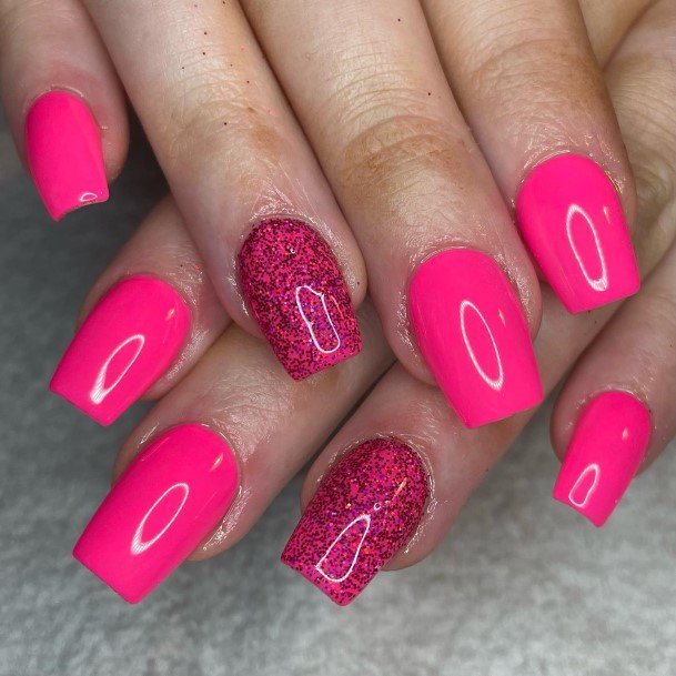 Girl With Graceful Bright Pink Nails