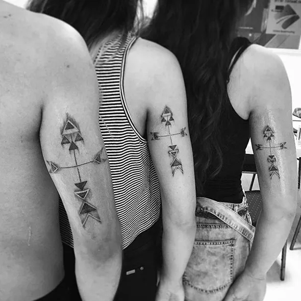 Girl With Graceful Brother Sister Tattoos