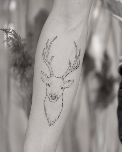 Girl With Graceful Caribou Reindeer Tattoos