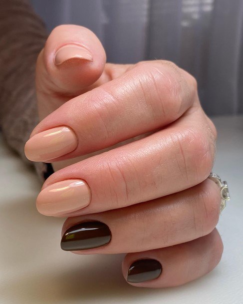 Girl With Graceful Chocolate Nails