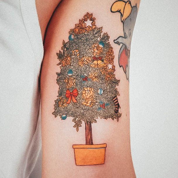 Girl With Graceful Christmas Tree Tattoos