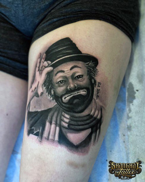 Girl With Graceful Clown Tattoos