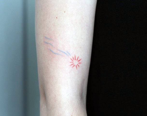 Girl With Graceful Comet Tattoos