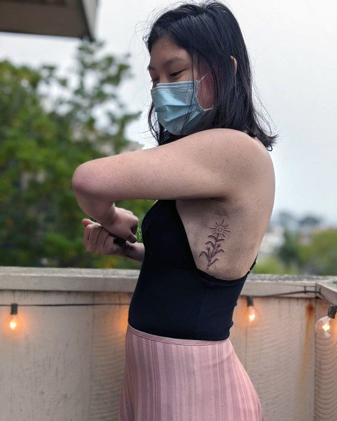 Girl With Graceful Corn Tattoos