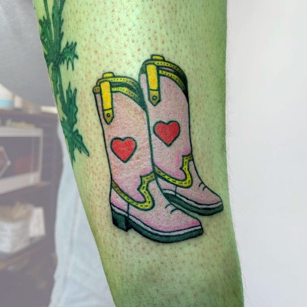 Girl With Graceful Cowboy Boot Tattoos