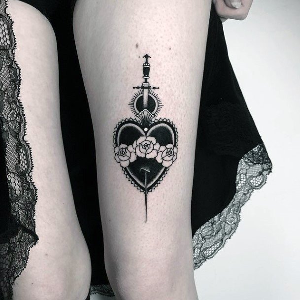 Girl With Graceful Dagger Heart Tattoos