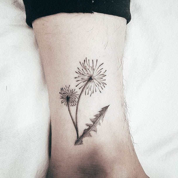 Girl With Graceful Dandelion Tattoos