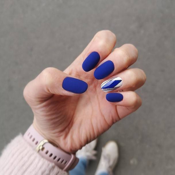 Girl With Graceful Dark Blue Matte Nails