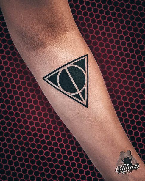 Girl With Graceful Deathly Hallows Tattoos