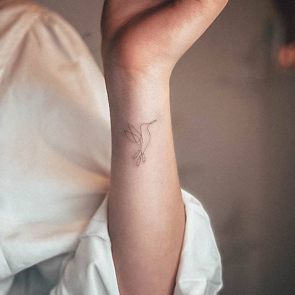 Girl With Graceful Fine Line Tattoos