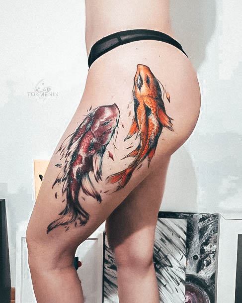 Girl With Graceful Fish Tattoos