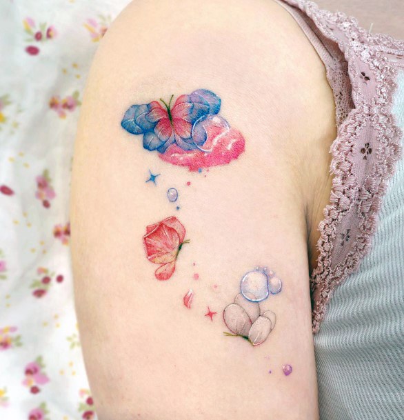 Girl With Graceful Flower Petal Tattoos