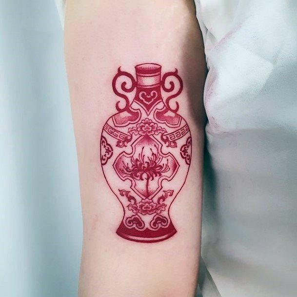 Girl With Graceful Flower Vase Tattoos