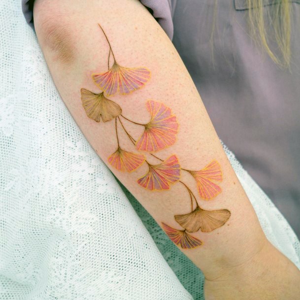 Girl With Graceful Ginkgo Tattoos