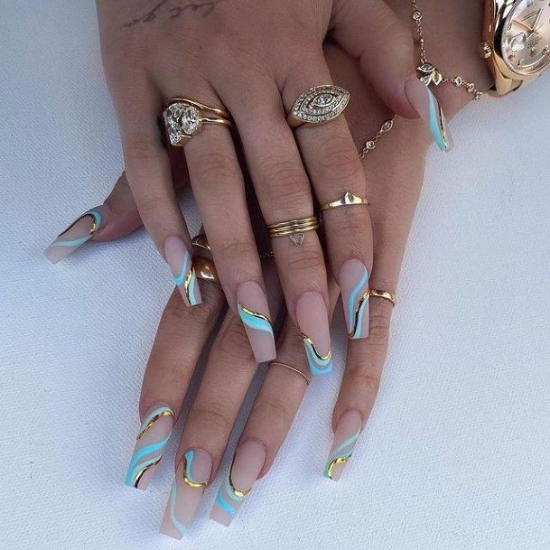 Girl With Graceful Gold Nails