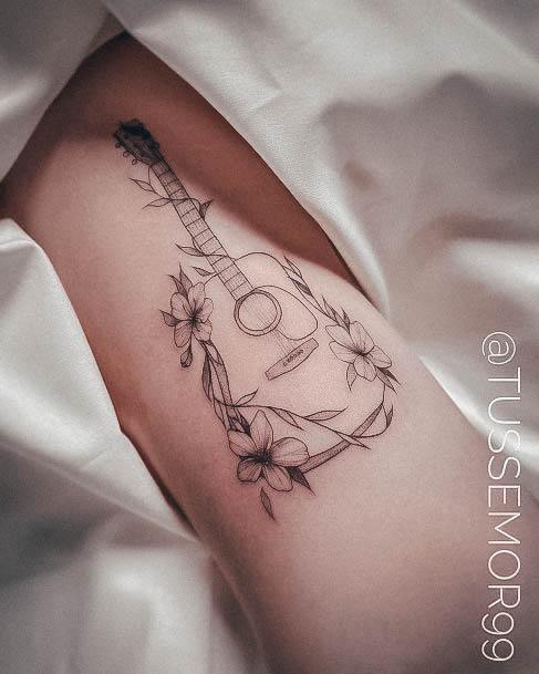 Girl With Graceful Guitar Tattoos