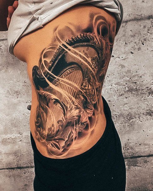 Girl With Graceful Harp Tattoos