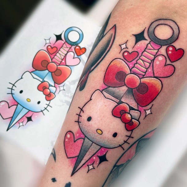 Girl With Graceful Hello Kitty Tattoos