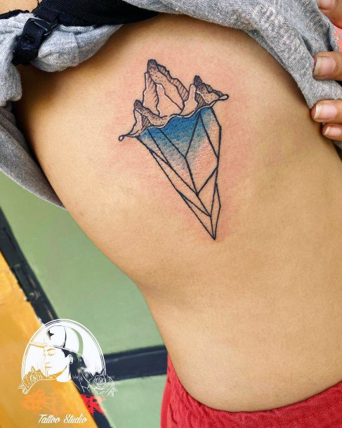 Girl With Graceful Iceberg Tattoos