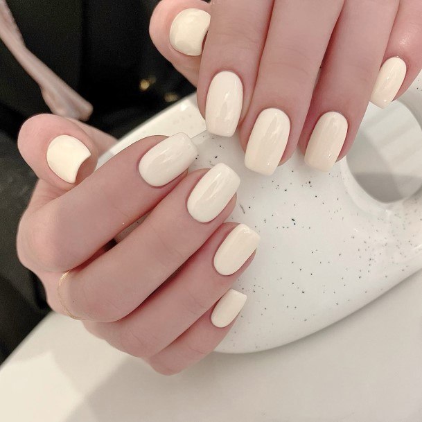 Girl With Graceful Ivory Nails