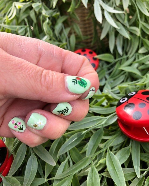 Girl With Graceful Ladybug Nails