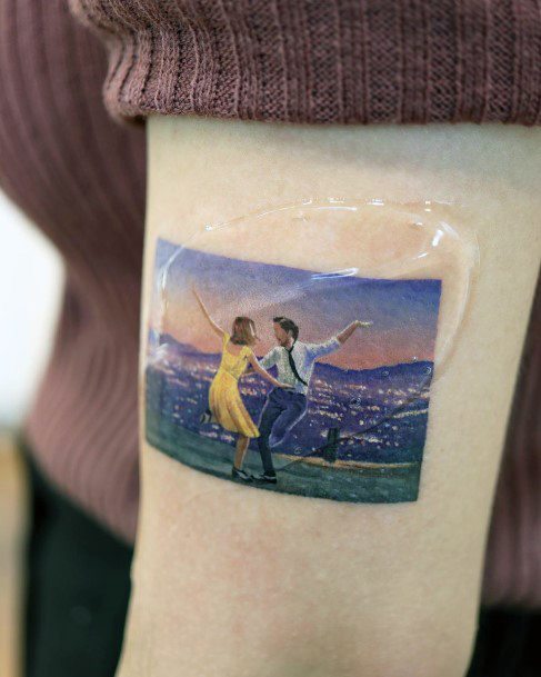 Girl With Graceful Landscape Tattoos