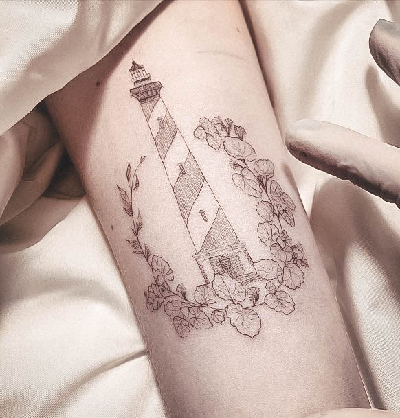 Girl With Graceful Lighthouse Tattoos