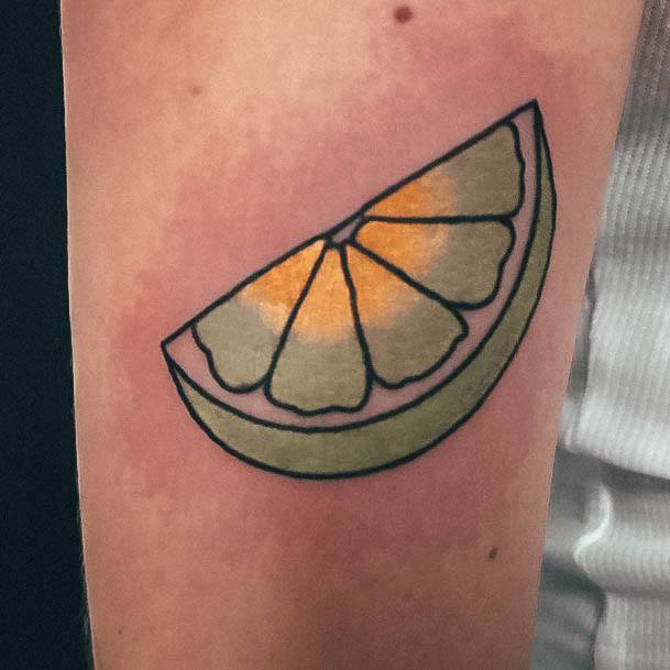 Girl With Graceful Lime Tattoos