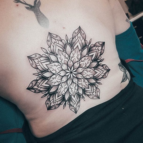 Girl With Graceful Lower Back Tattoos