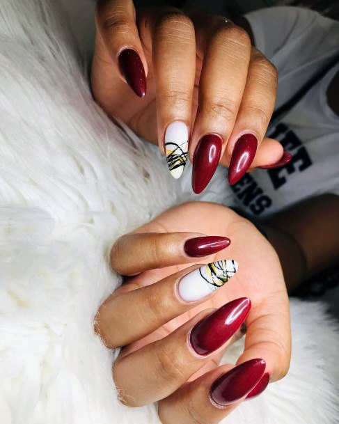 Girl With Graceful Maroon Dress Nails