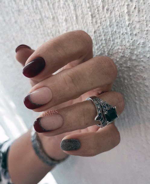 Girl With Graceful Maroon Nails