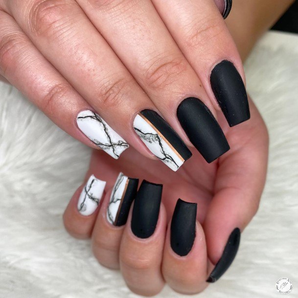 Girl With Graceful Matte Black And Gold Nails