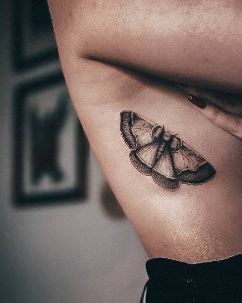 Girl With Graceful Moth Tattoos