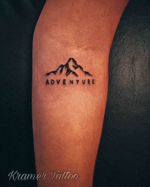 Girl With Graceful Mountain Tattoos