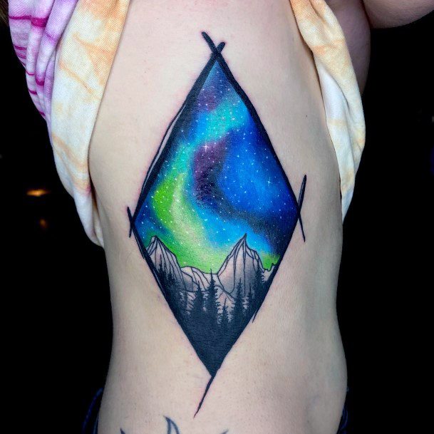 Girl With Graceful Northern Lights Tattoos