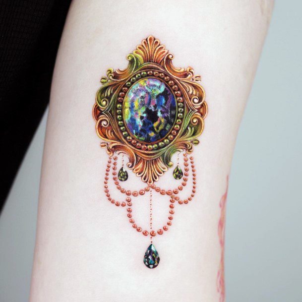 Girl With Graceful Opal Tattoos