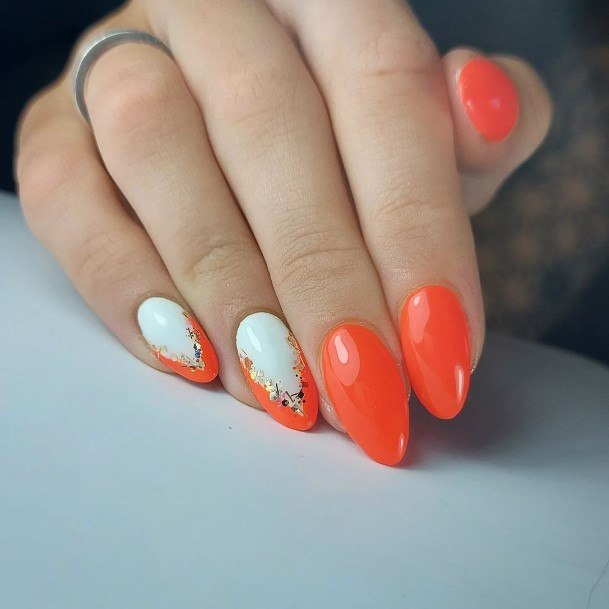 Girl With Graceful Orange And White Nails