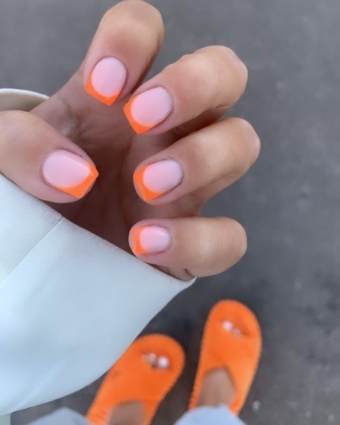 Girl With Graceful Orange French Tip Nails