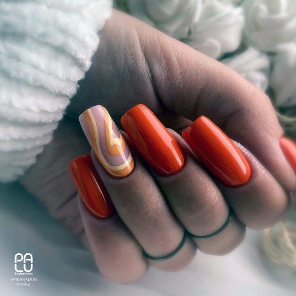 Girl With Graceful Orange Nails