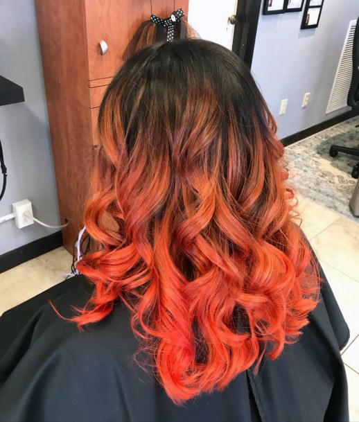 Girl With Graceful Orange Ombre Hairstyless