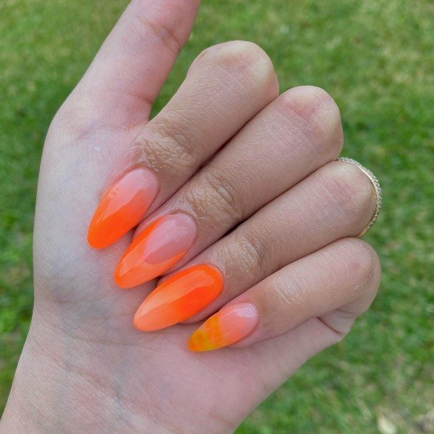 Girl With Graceful Orange Ombre Nails