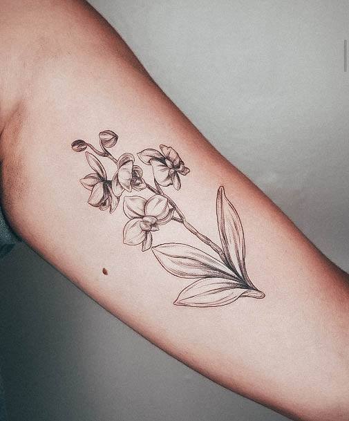 Girl With Graceful Orchid Tattoos